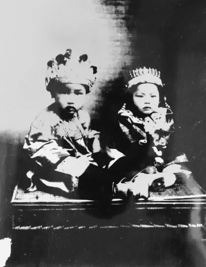 StateLibQld 1 116820 Two young children in traditional Chinese dress, 1907