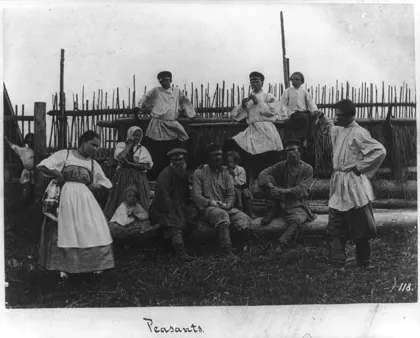 Twelve peasants, St. Petersburg, Russia; 2 dancing; 1 playing flute, 1890